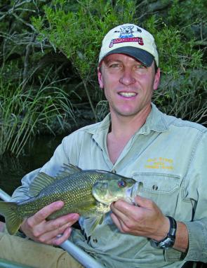 Dave Thompson, with a lovely Upper Macleay bass. This fish took a small bibles shad, a proven winner when fishing the waters around Bass Lodge.